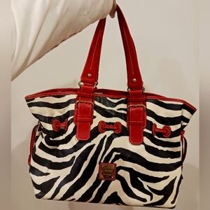 Dooney and Bourke zebra striped bag with red lining